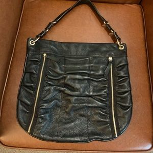 Smart and sleek Black Handbag
